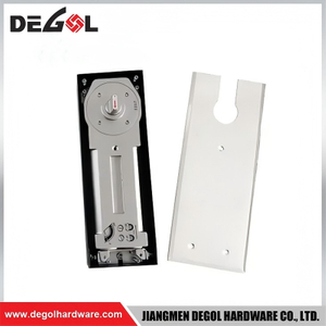 La bisagra universal del piso adapta la puerta de madera del metal y de cristal para las piezas del hardware del edificio